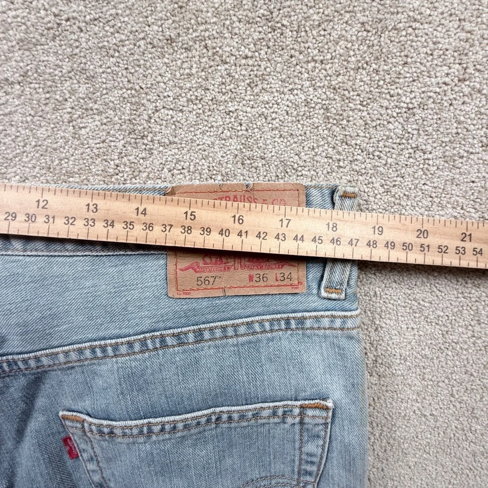 Levi's 567 Loose Boot Cut Jeans Mens 36x31 (tag 36x34) Light Wash Denim Blue Y2K